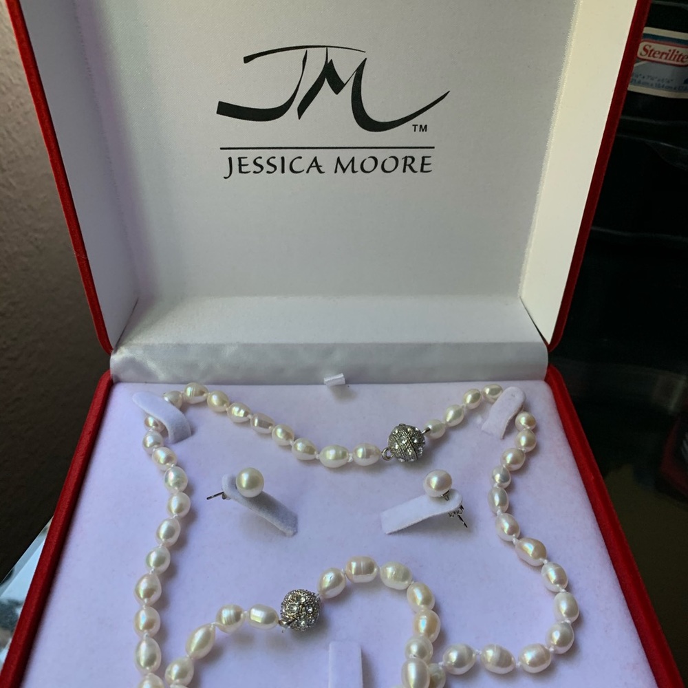 Necklace, earrings, and bracelet.